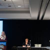 The panelist listen in as Jordan Chrispell shares her 10-minute presentation.